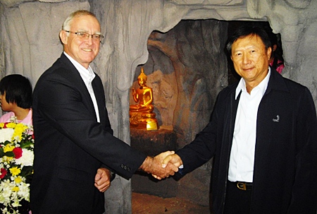 Tony shakes hands with Pracha Taerat, former Chonburi governor and now the Inspector General of the Ministry of Interior.